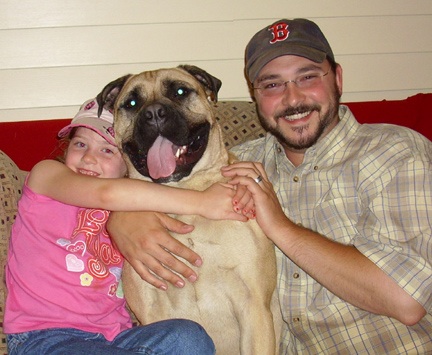 At home with daughter Brynn and family pet bullmastiff Georgia.
