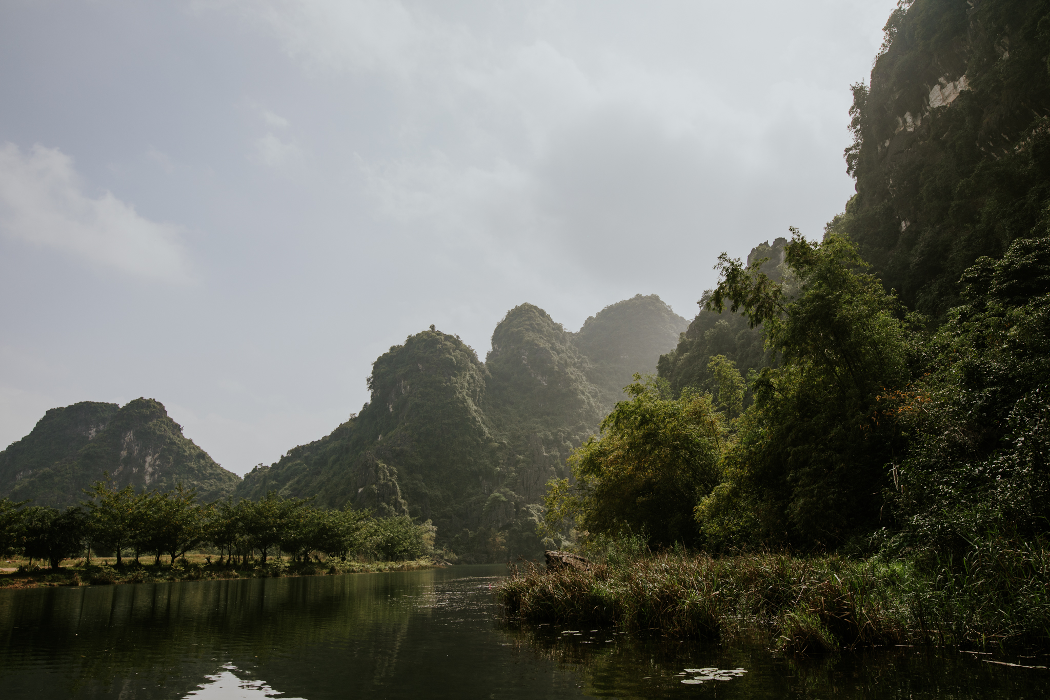 Trang An Grottoes Boat Ride - Ninh Binh Vietnam | Destination Elopement Photographer | Vow of the Wild