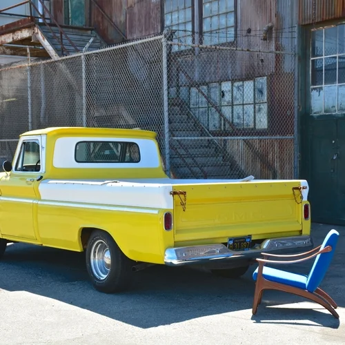 Yellow_GMC_Truck_with_Mid-Century_Lounge_Chair.jpg