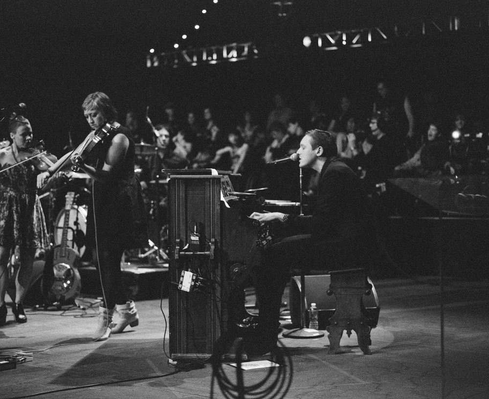 ⌃ Arcade Fire