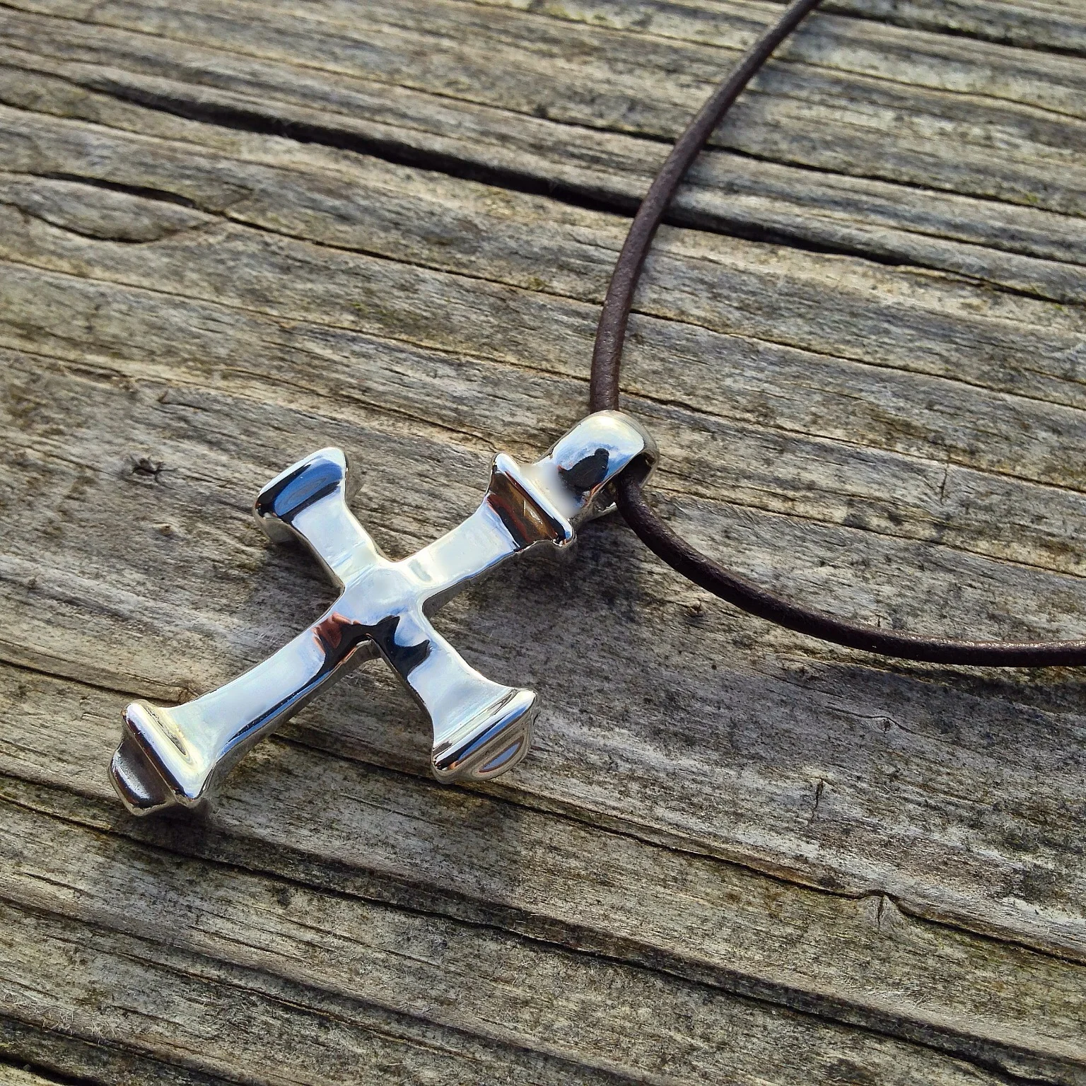 cross on leather .jpg