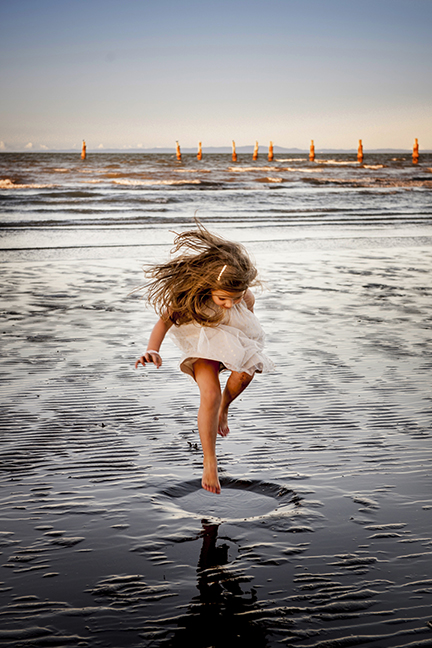 A shot from an old favorite spot near Brisbane, Shorncliffe Jetty. The perfect moment.. though her Mum wasn't impressed with getting her dress dirty.. until she saw the images! 