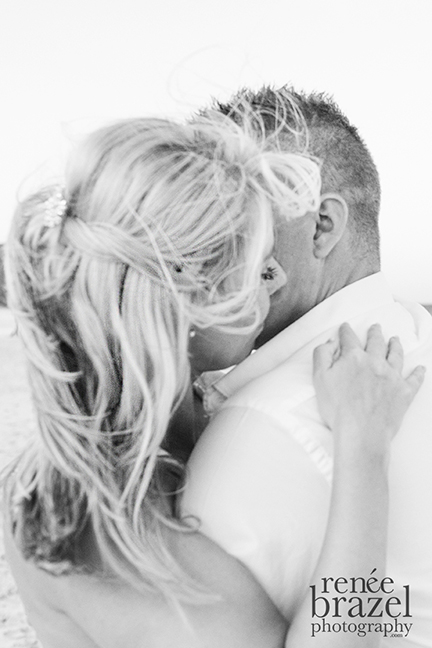 I just love the softness of this image. Light, bright and airy... well windy! Often these types of shots ended up being the couples favourite, the captured on the fly style. 