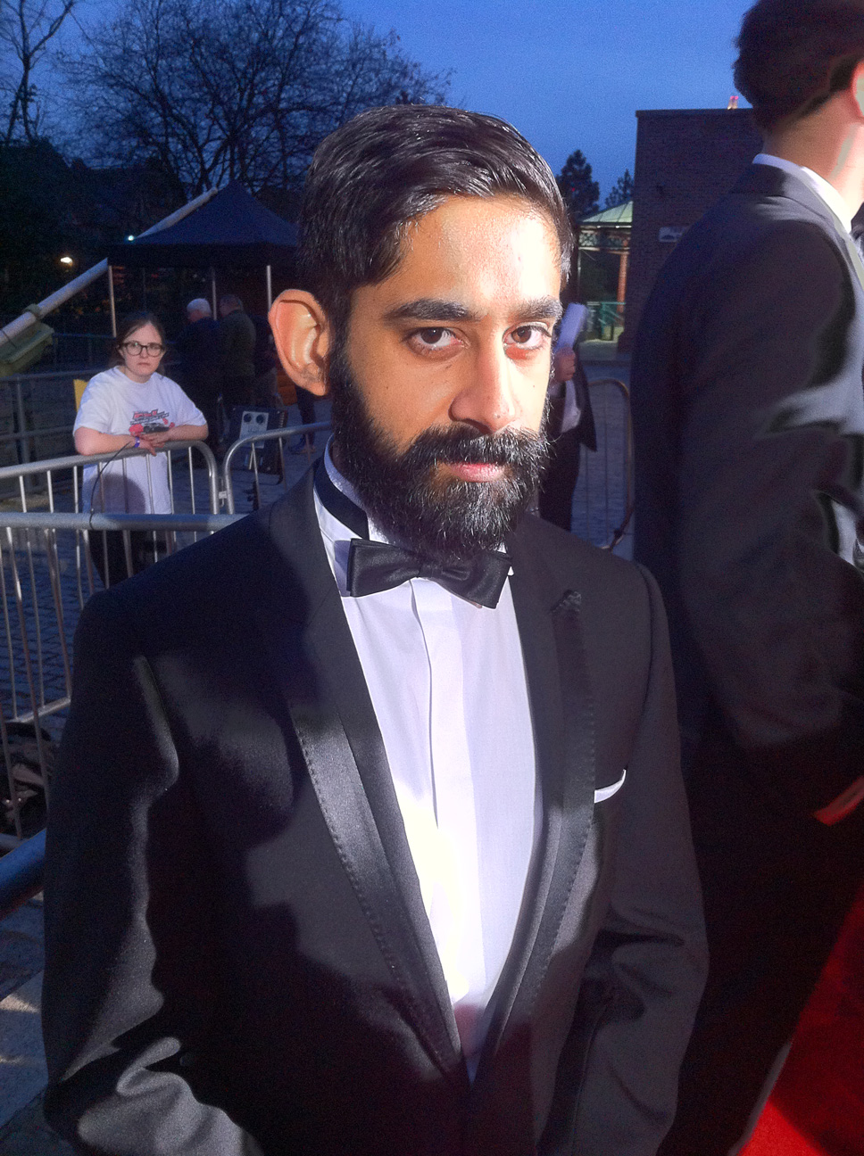  Manesh striking a pose on the red carpet on BAFTA night 