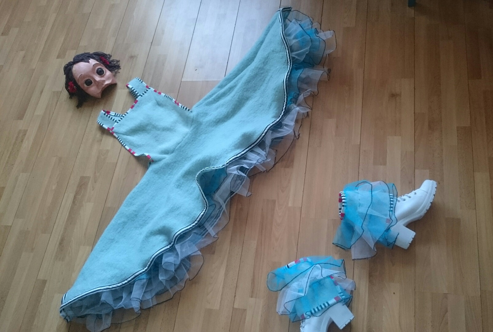 Origional costume by Cherry Head, half mask by Monika Solheim