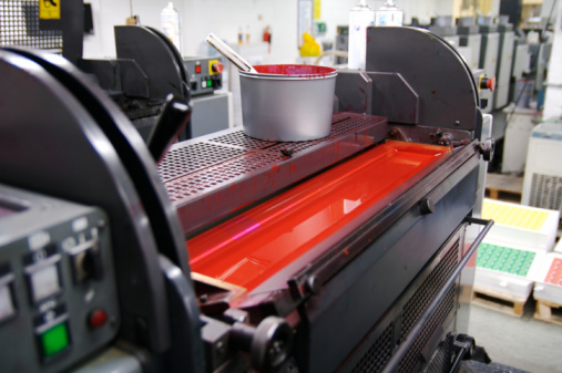 Photo of a printing press showing the magenta ink duct and printing ink, some of which may contain silver particles that can be recycled profitably by Specialty Metals Smelters & Refiners.