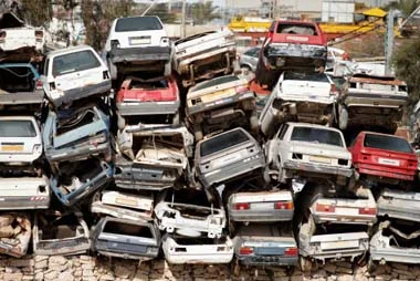 Image of junked cars, which hold a wealth of untapped platinum, palladium, rhodium and other precious metals in their catalytic converters, which Specialty Metals can recycle profitably for you.