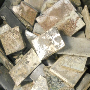 Photo of silver cadmium electrical contacts scrap that customers have shipped to Specialty Metals for recycling and refining.