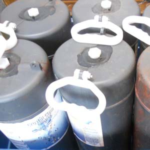 Photo of used silver recovery columns sent to Specialty Metals for the profitable extraction and recycling of the electrolytic silver flake residue they still contain.