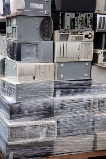 Photo of scrap computers with circuit boards containing gold, platinum and other precious metals that can be recycled by Specialty Metals.