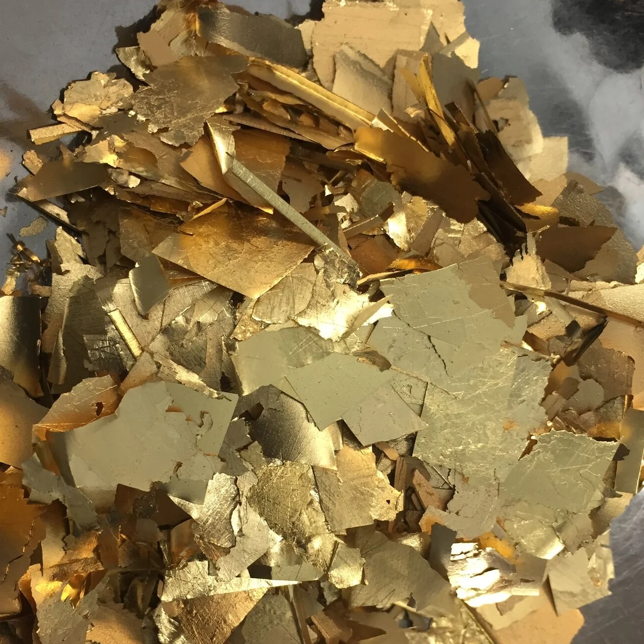 Image of an assortment of karat gold jewelry, which Specialty Metals can recycle and refine for the best prices for individuals and businesses.