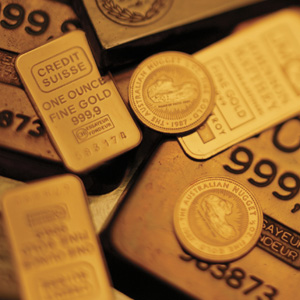 Photo of gold bars and ingots, which Specialty Metals refines and recycles from your fine gold bullion, coins, ingots and bars.