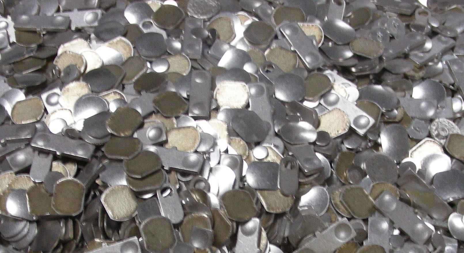 Shown: Jewelry and jewelry scrap containing platinum, silver and other platinum group metals like palladium and rhodium that our customers have sent in for recycling and refining.