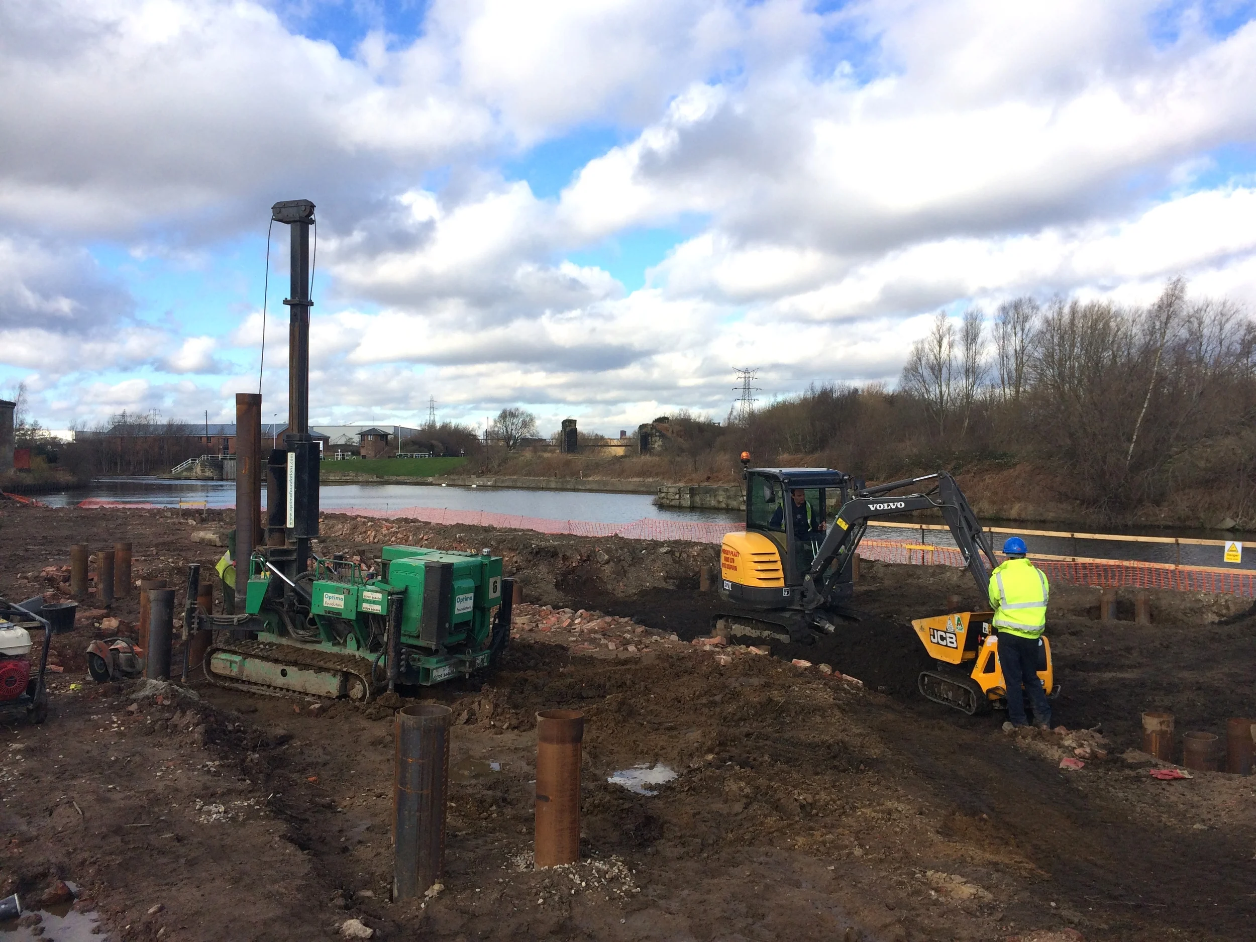  Excavating around the pilings ready for filing and for the pile caps 