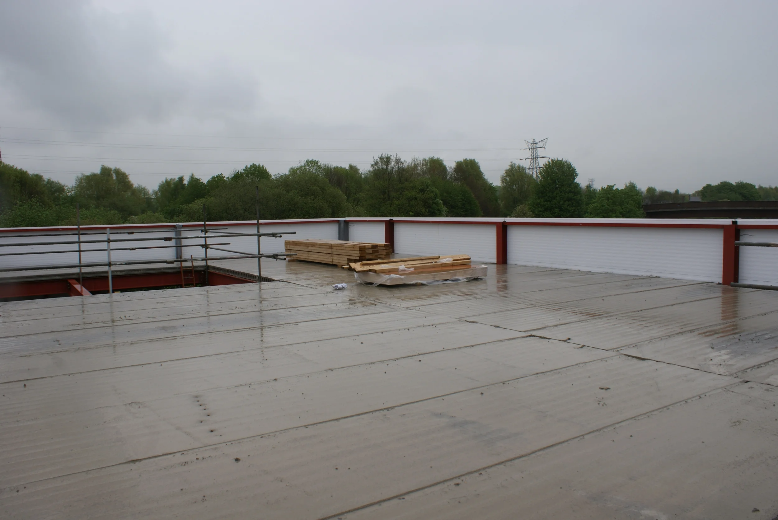  The pre-cast concrete is now all in place, the remaining areas will be boarded over to enable access to an upward extension in the future and the insulated roofing membrane will go on top. 
