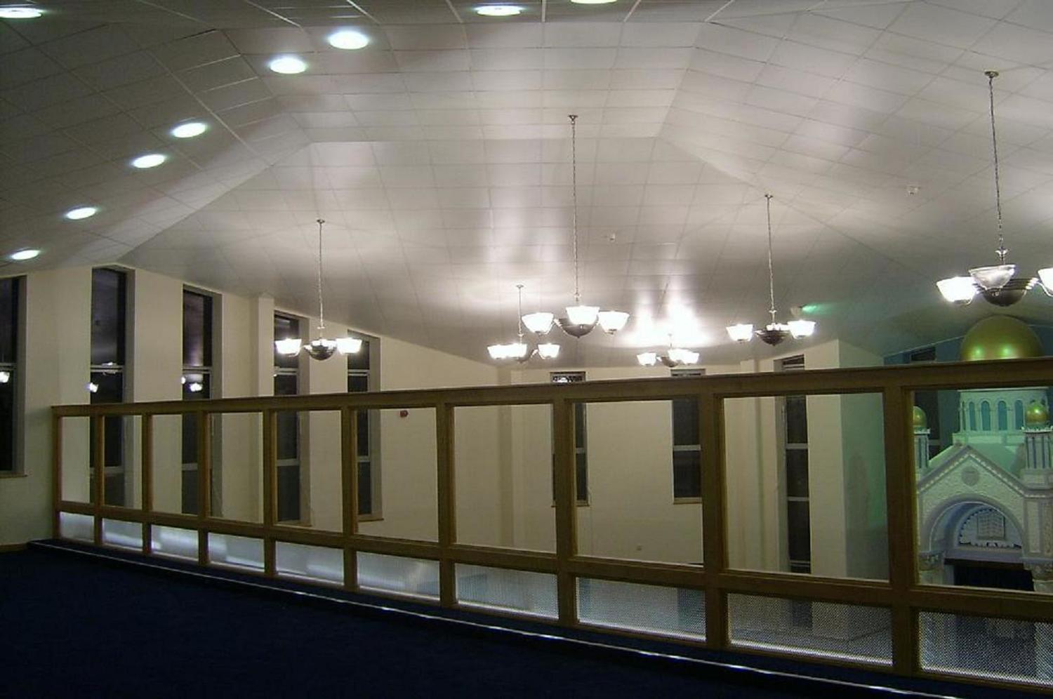 View from the ladies gallery showing the faceted ceiling designed to achieve the best acoustic performance. 