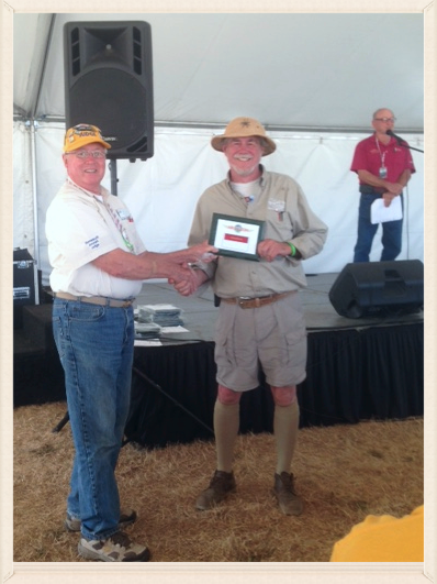 Bob receives the award at the Exhibits tent after the air show.