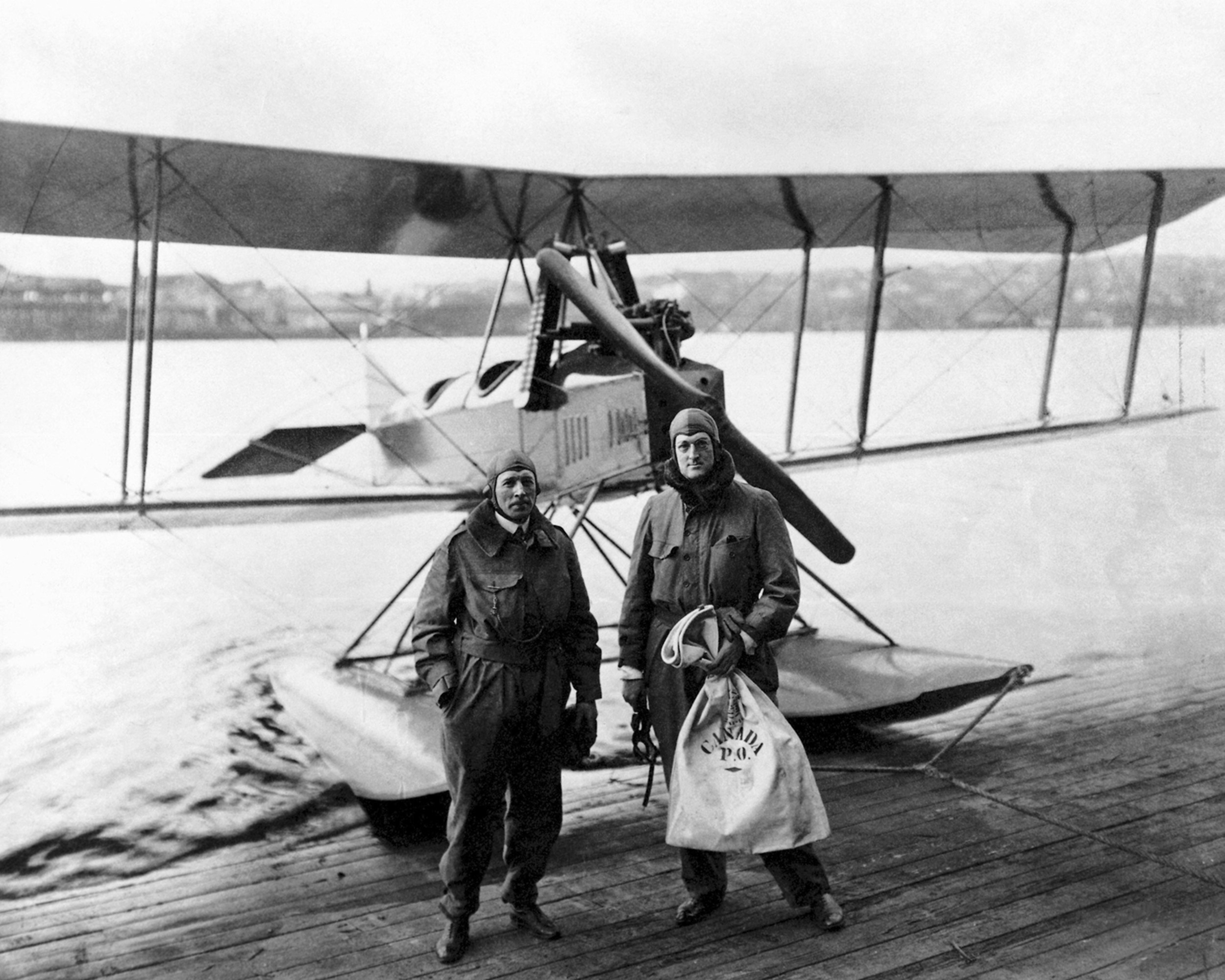   Eddie Hubbard and William Boeing with the Boeing Model C following completion of the first international airmail flight, March 3, 1919 . (Boeing Archives)   
