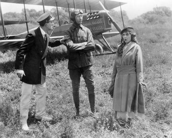  Donald Crisp, Glenn Martin, and Mary Pickford in the 1915 silent comedy "A Girl of Yesterday"   &nbsp;.    A Martin Model TT biplane is behind them.  ( Wisconsin Center for Film and Theater Research )&nbsp;  