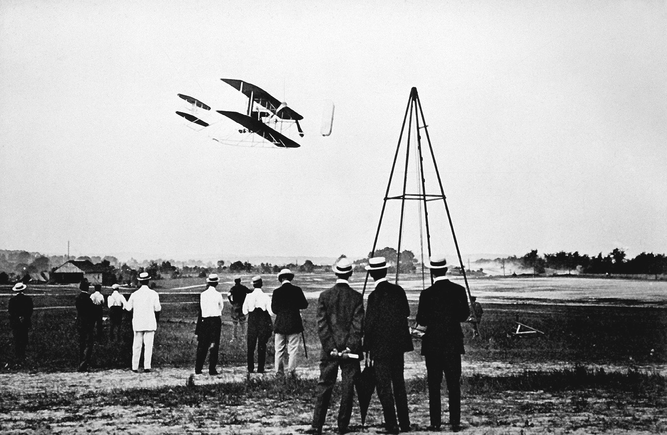  The Wright Brothers test fly their aircraft on Fort Myer's parade field. 