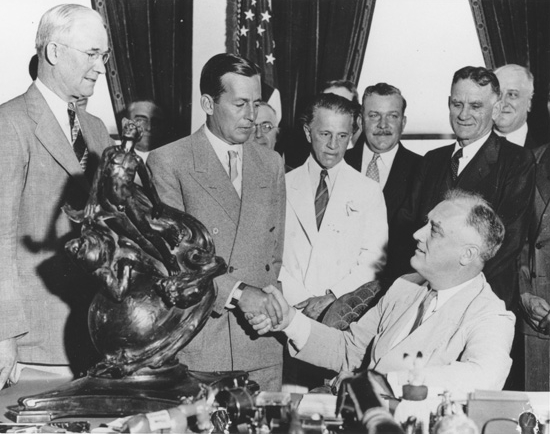  In 1935 President Roosevelt presented Douglas and his engineers with the Collier Trophy for outstanding achievements in flight made by the DC-2. &nbsp; (Santa Monica Public Library)  