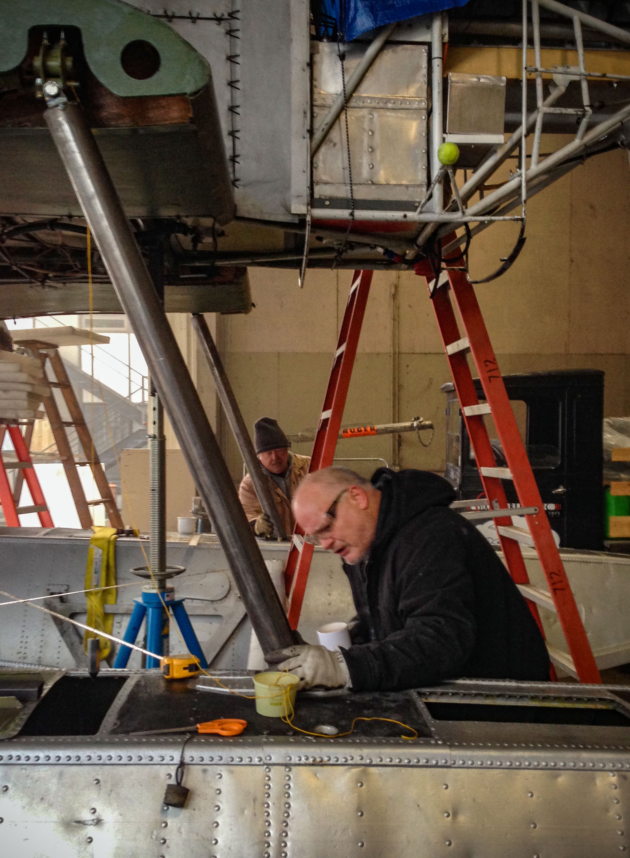 Gary Carmichael, welder, and Mitch Herrick, fitter, working on the float struts.