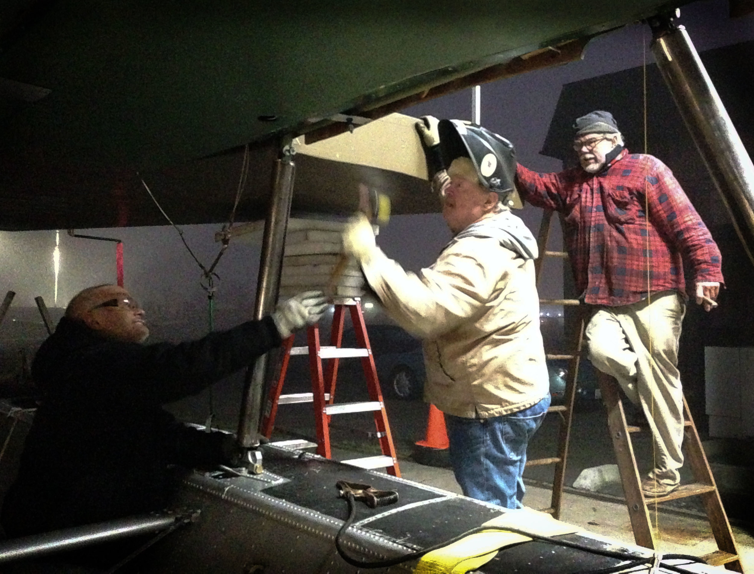 Mitch, Gary, and Bob checking the strut angle.