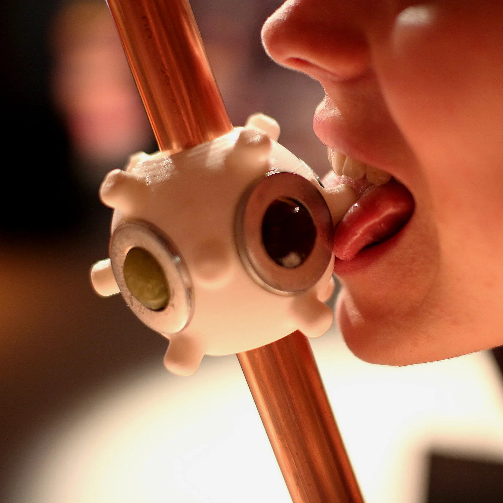 Moving the ball with your tongue while tasting
