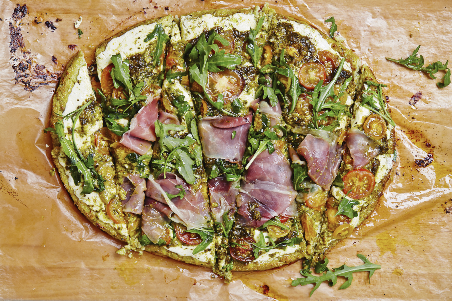 Cauliflower Pizza with Prosciutto, Tomato & Pesto (GF)