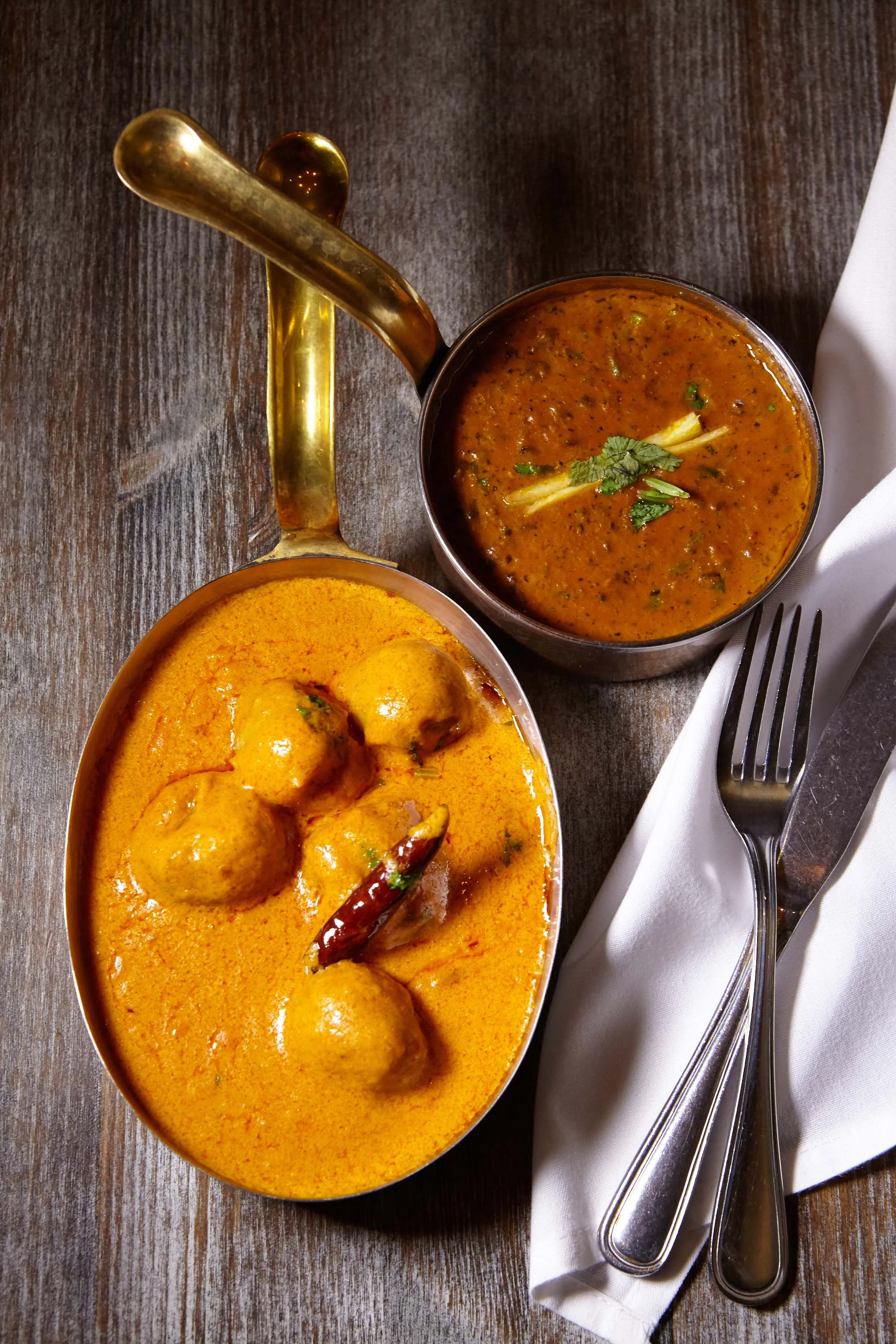 Sahib dal (in back) with Dum Olav (Kashmir-style potatoes) (in front) at Sahib.