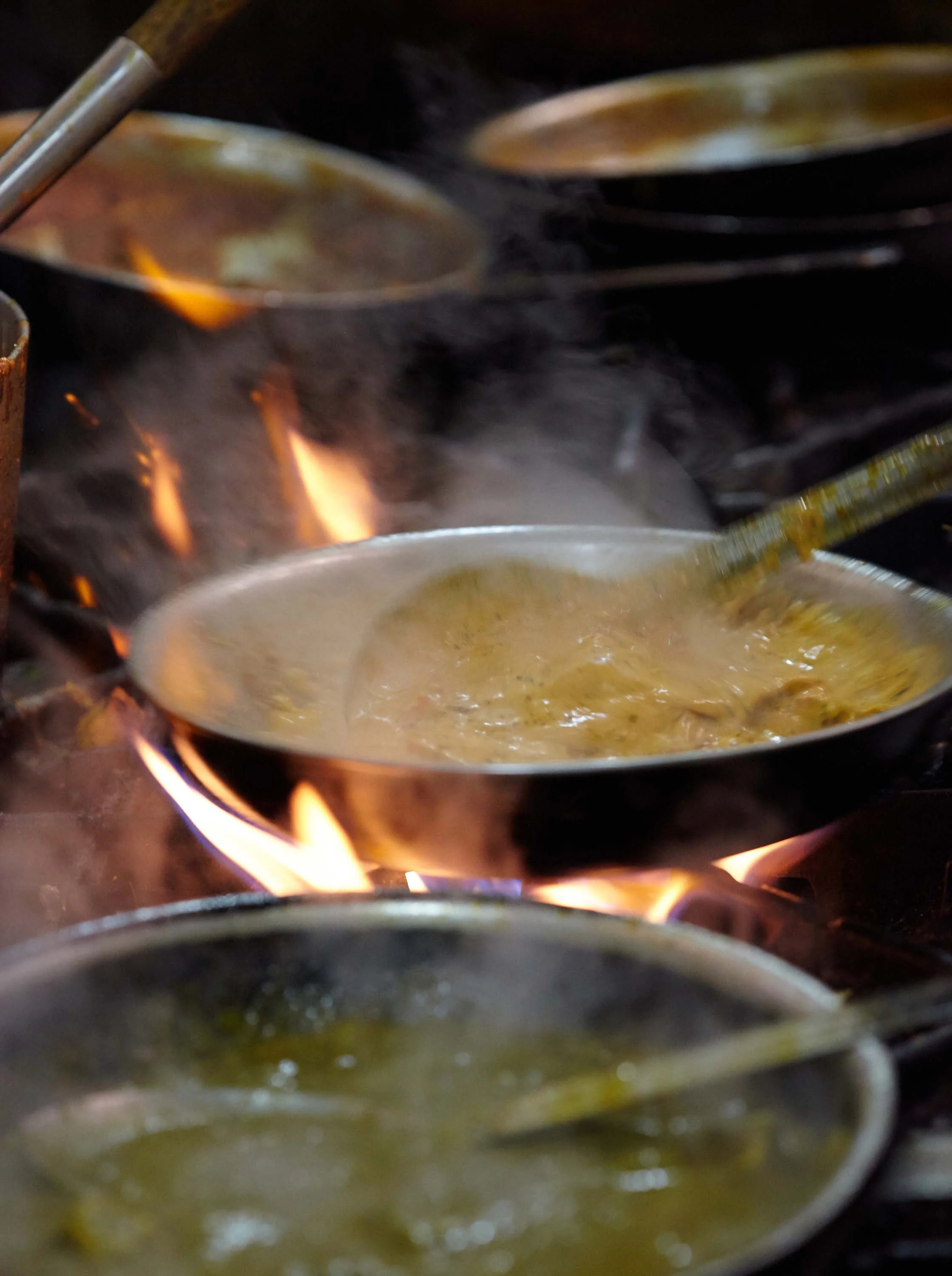 Cooking in the kitchen at Sahib.