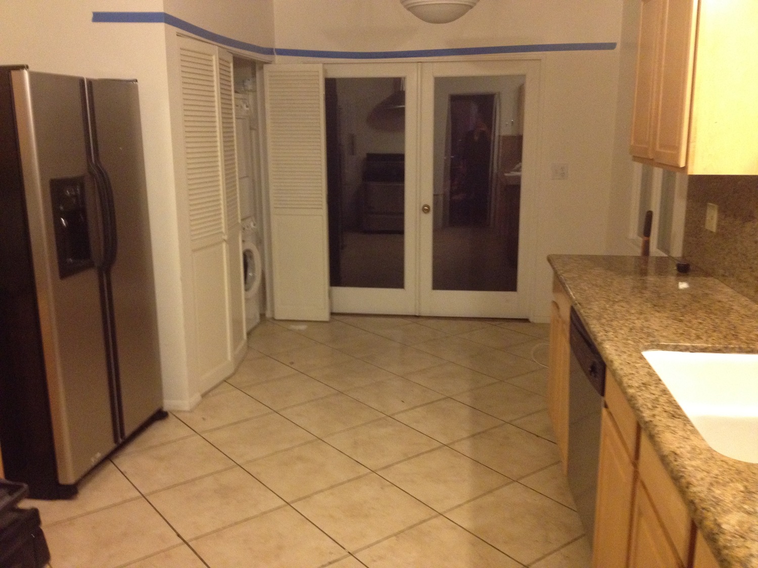 BEFORE - This was the old kitchen, which ended where the Hicks pendants hang in the picture above. Every single surface was torn out, down to the studs, and we pushed back and to the left to create the new family room and powder room.