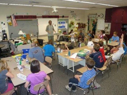Bill in front of class1.JPG