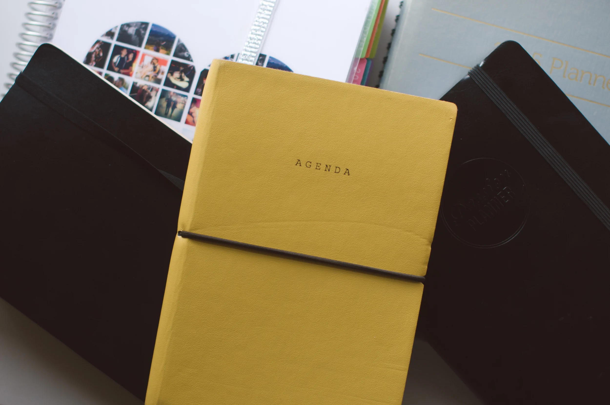From left to right: Moleskine, Poketo, and Passion Planner