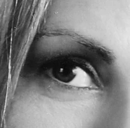 CAT CLAUSEN HEADSHOT WITH ANDY OIL IN BKGD eye only b and w .jpg