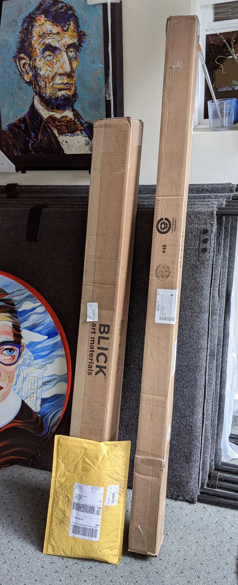 Two boxes have arrived to my studio which contain my stretcher bars and camvas. I will assemble the bars and glue them together with clamps. Next I will stretch the canvas over the 40" x 50" bars.