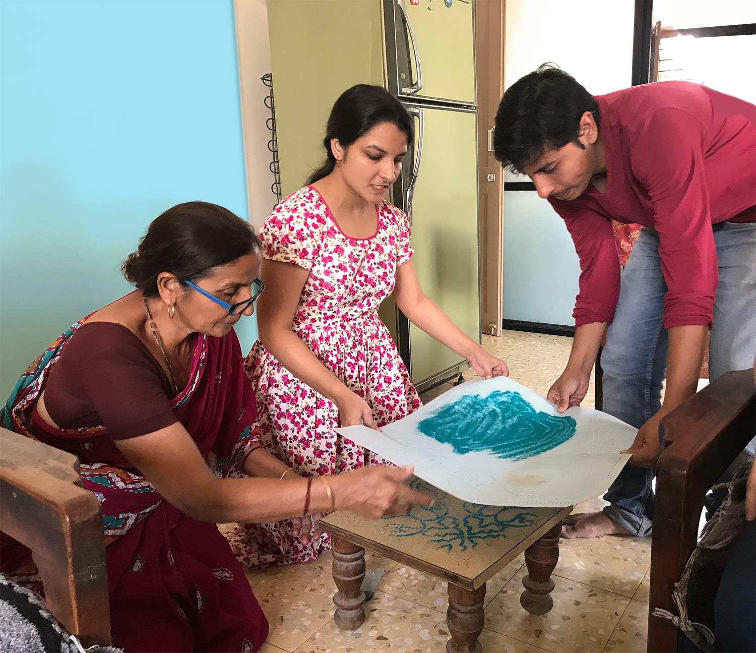 Family Gaja shows us how to make rangoli, a traditional diwali sand decoration