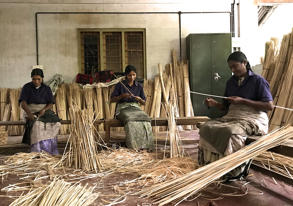 Preparing bamboo sticks. 
