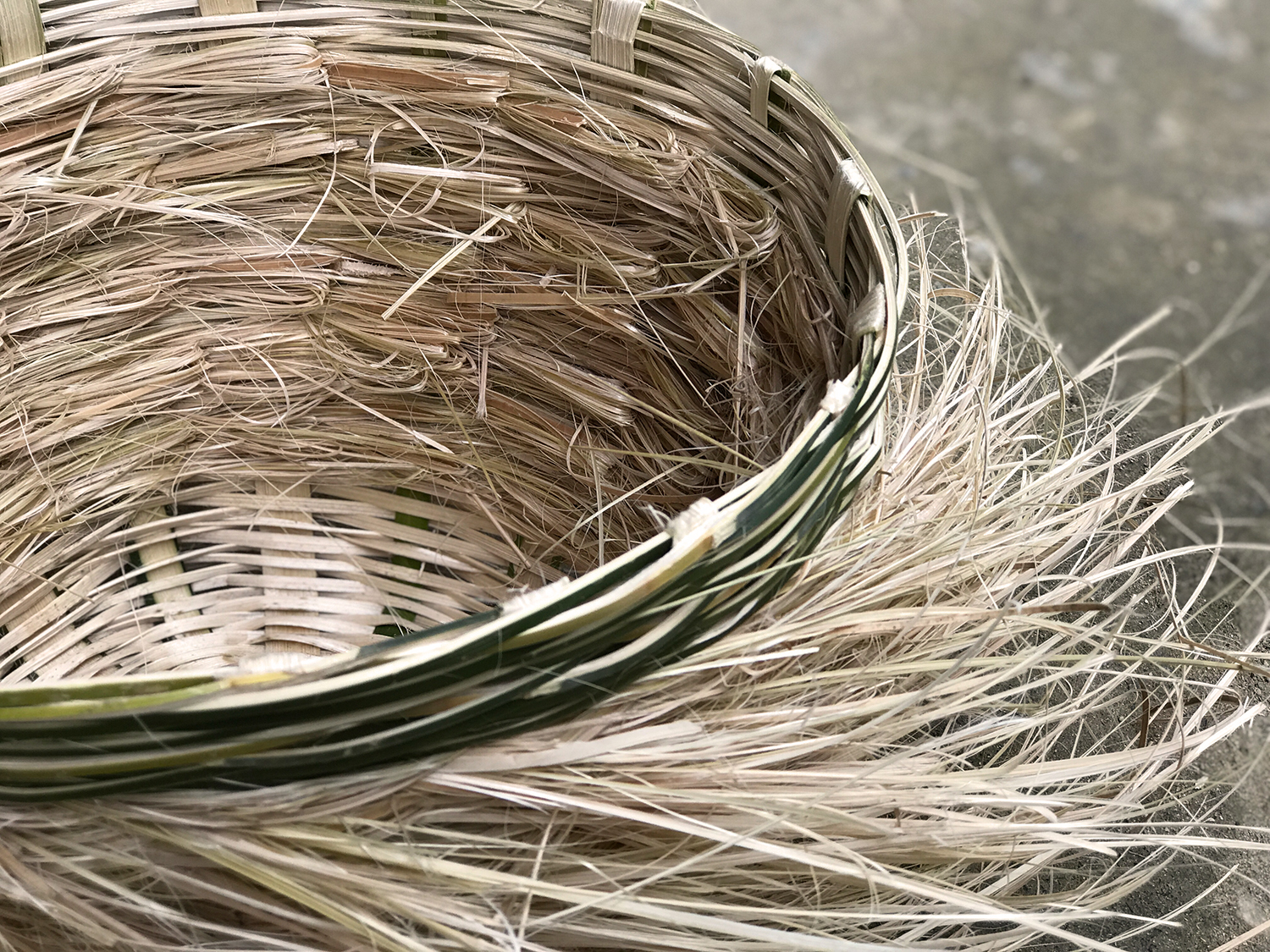 Basket No. 2 made of bamboo wast material.