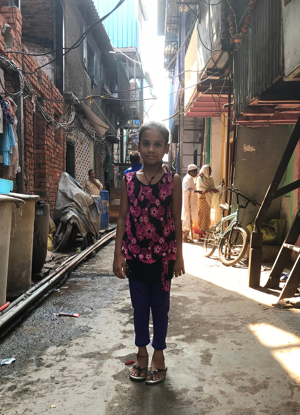 Girl in the streets of Dharavi, Mumbai