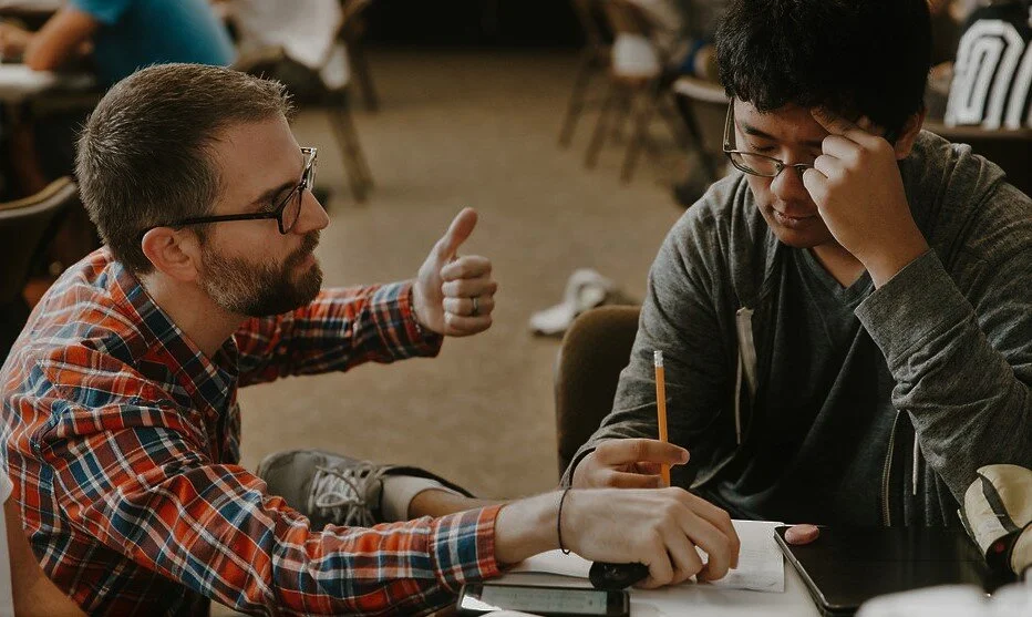 Ethan + Student cropped.jpg