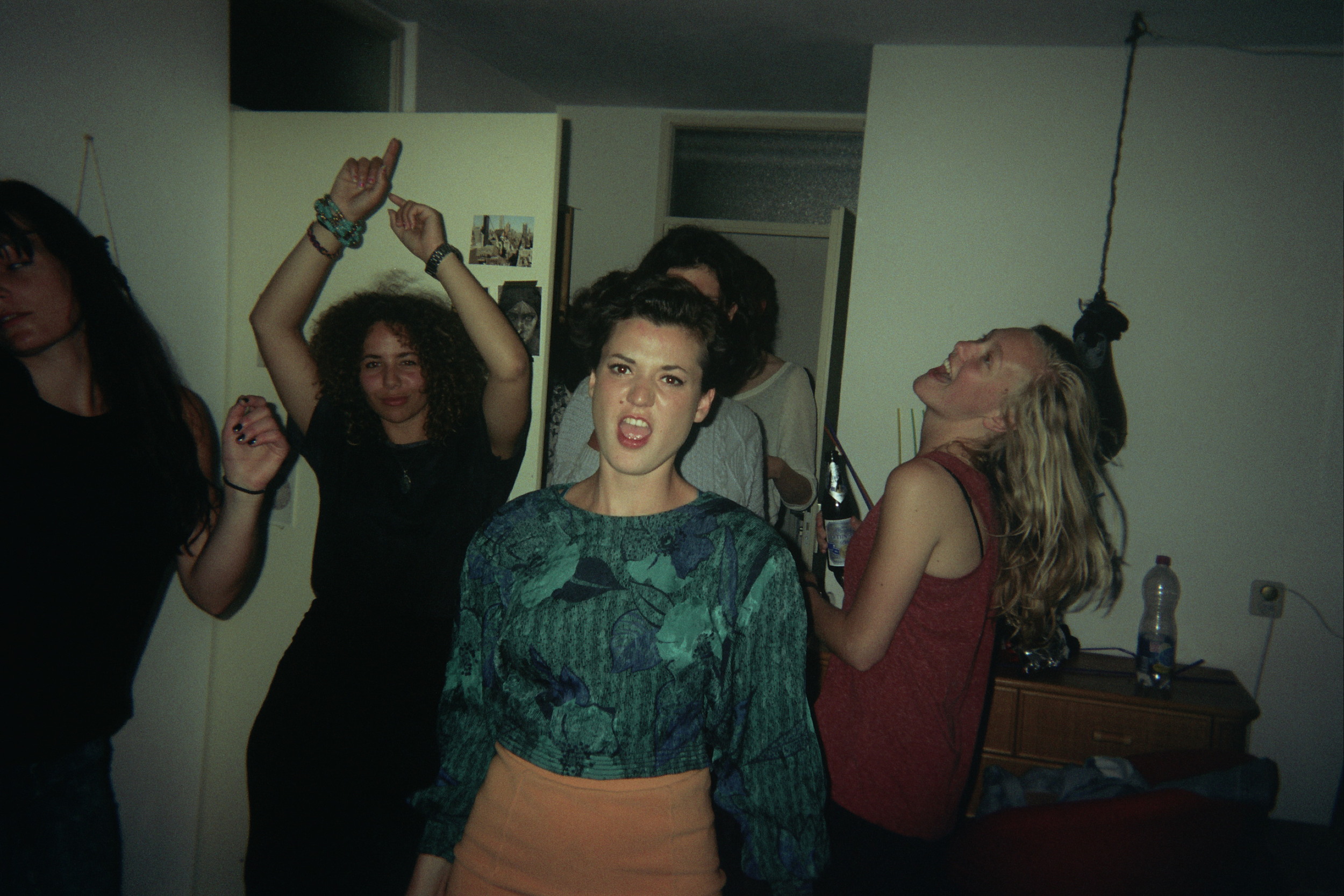 We arrive at Linn’s house party a little late. I can’t remember what the party was for. But it’s fucking summer, who needs more reason to party? That’s her, right in the middle. Probably all coked up. Everyone’s probably on everything. It sure looks like things are gonna get a little wild tonight.
