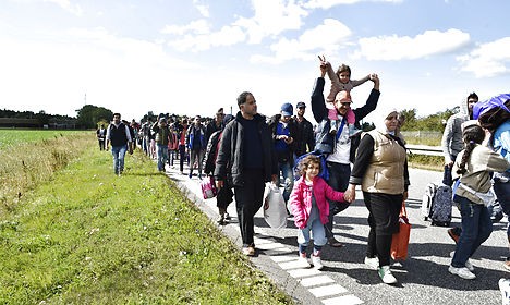 Refugees attempting to walk over 150 km from Rødby in Denmark to Malmö in Sweden. Photo: Bax Lindhardt/Scanpix