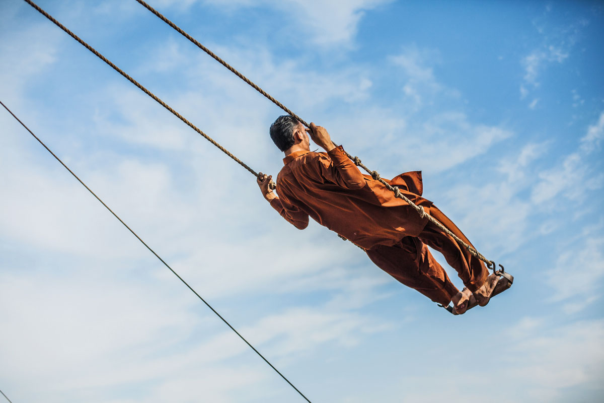 Man on Swing: Lahore