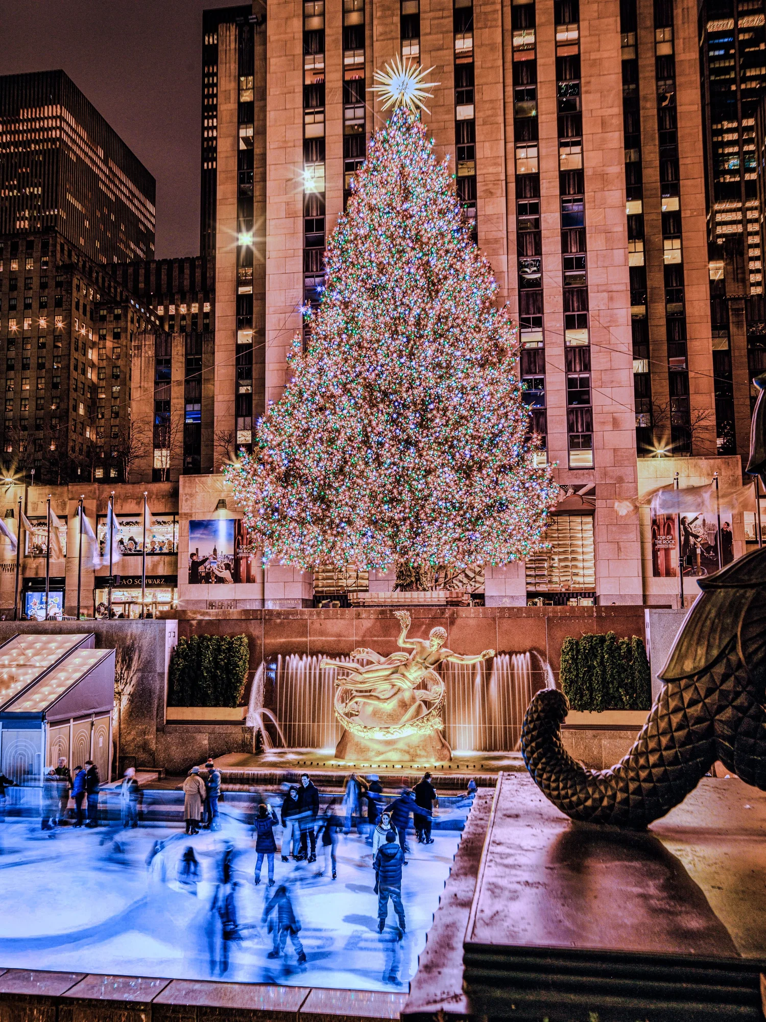 The Rockefeller Center Christmas tree above the skating rink