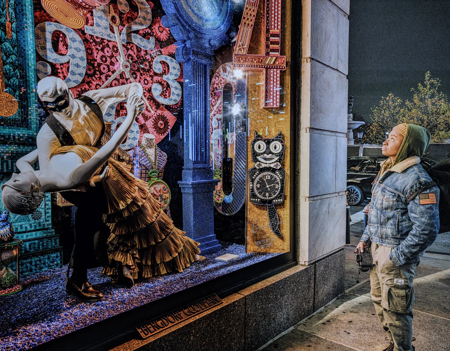 A visitor at Bergdorf Goodman’s holiday windows