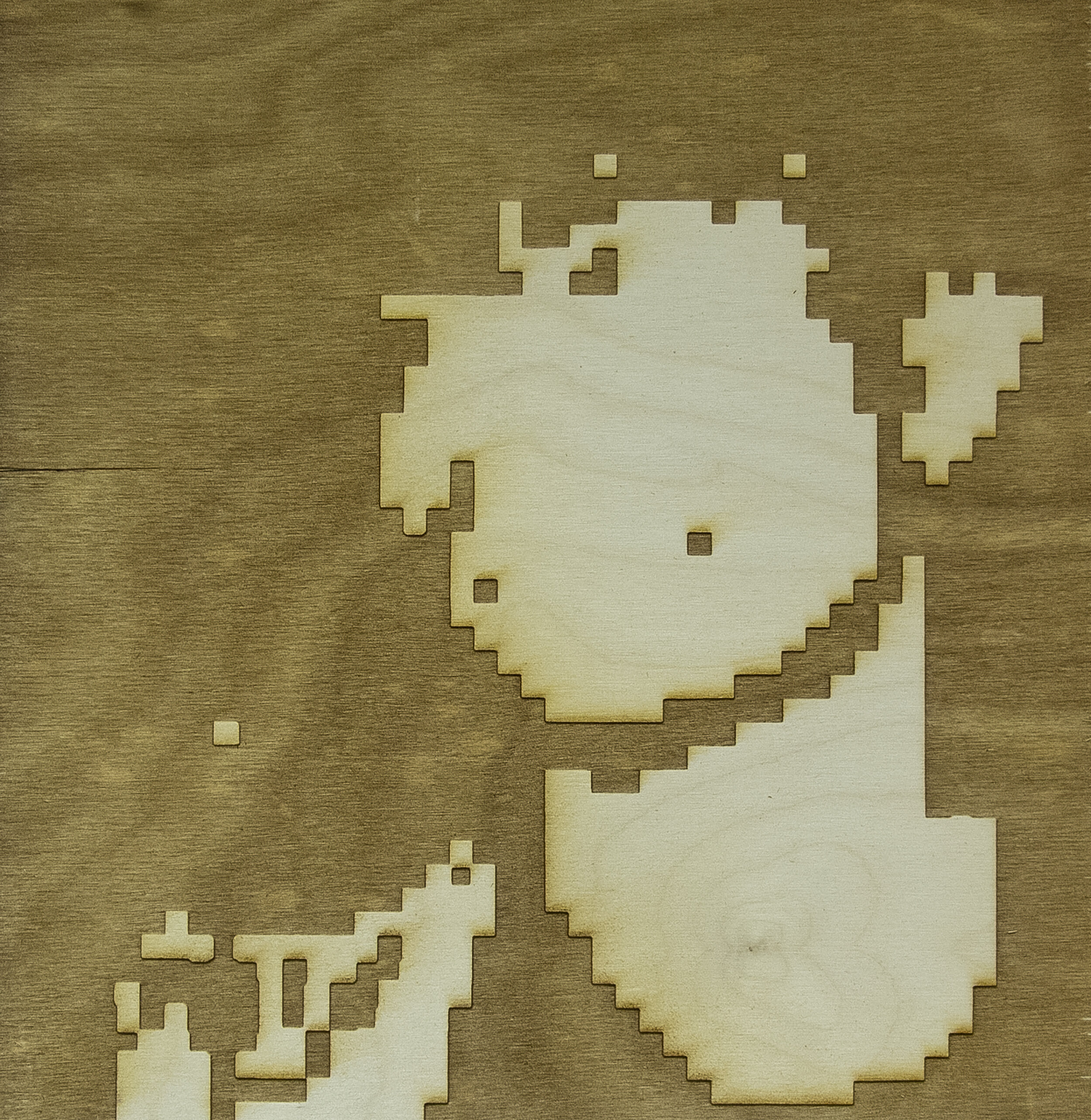 Oscar FLores-Montero - "Self-portrait"; Laser etched wood