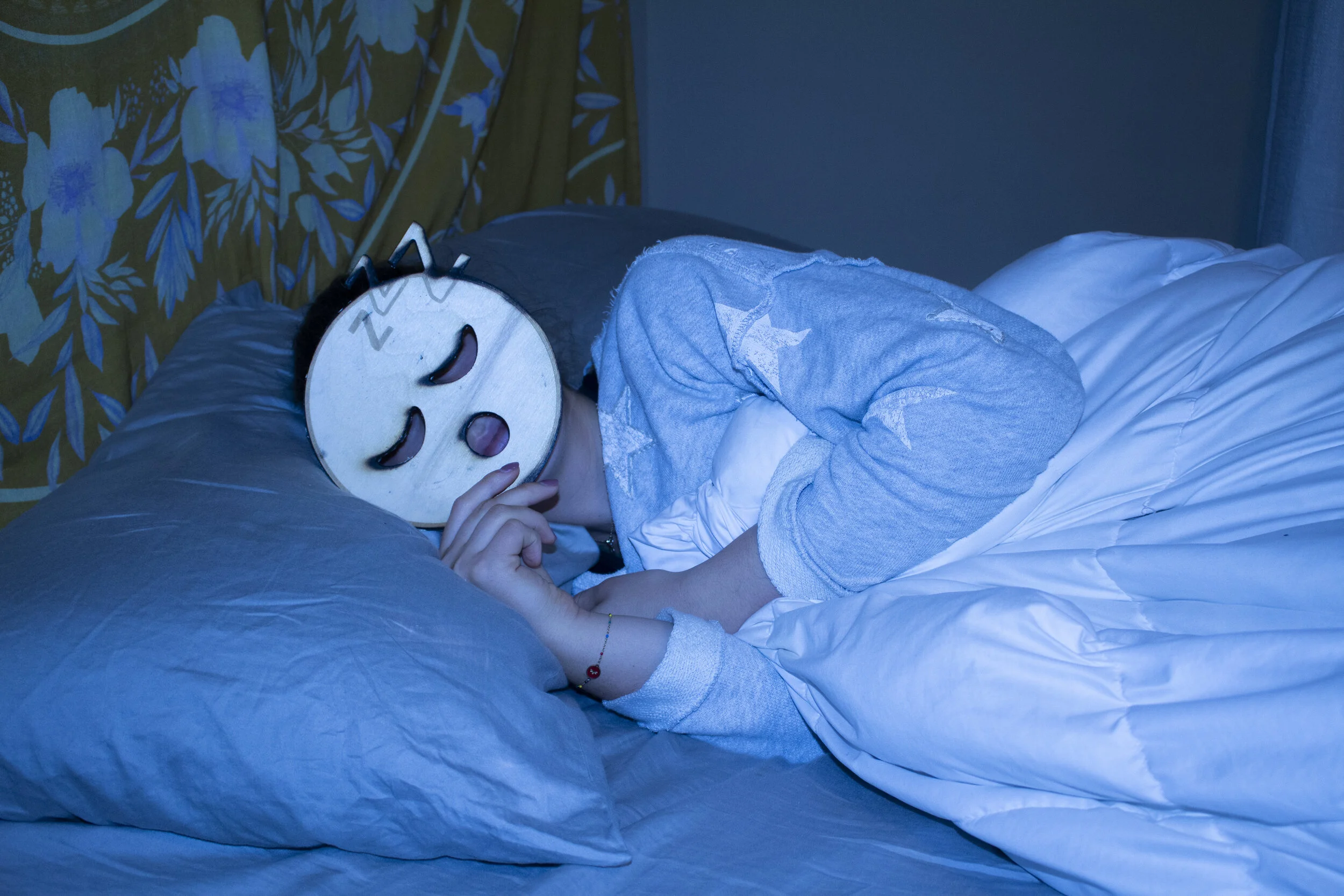 Meagan Pruitt - "Emoji series: Sleeping"; Laser engraved/cut wood, digital print on paper