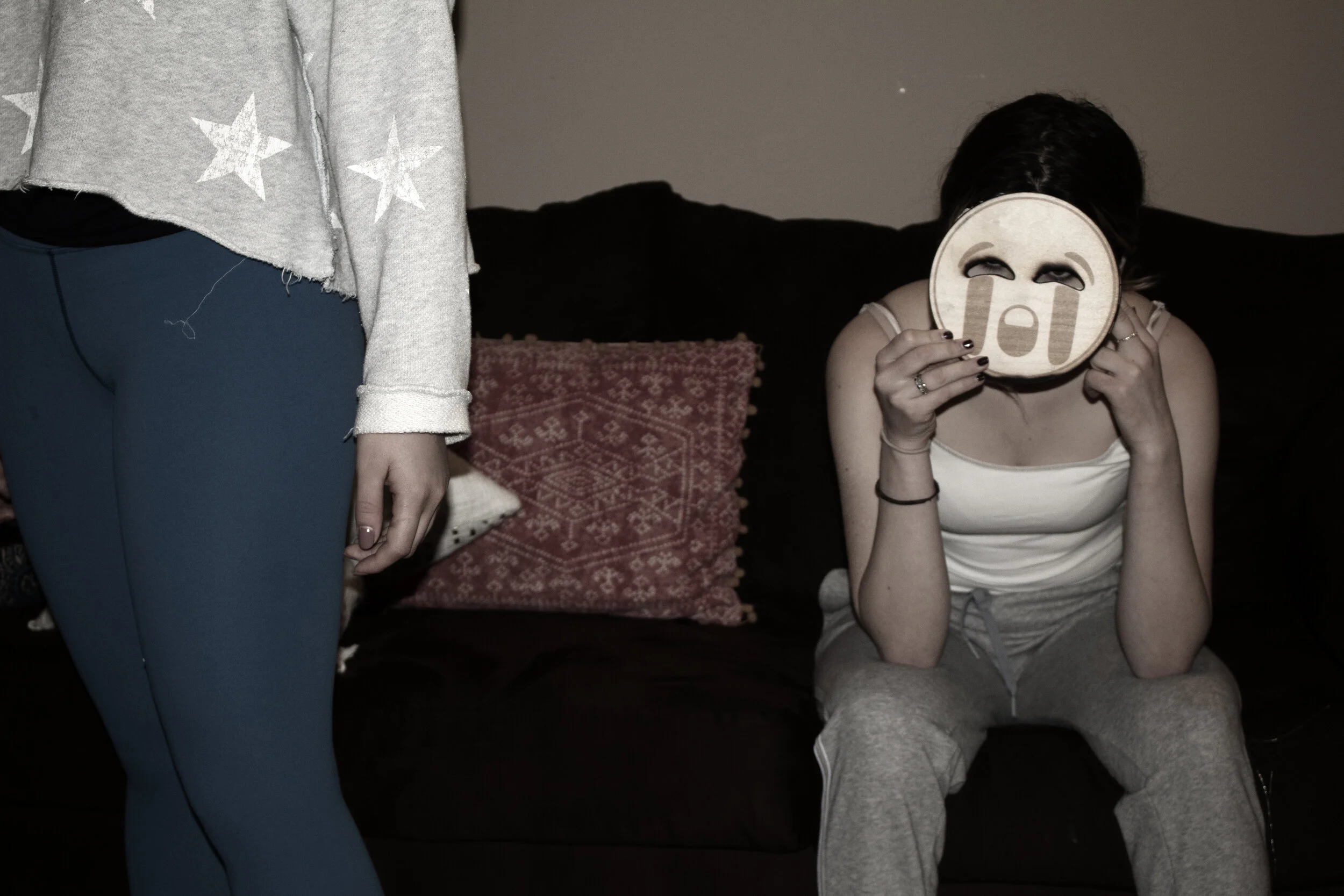 Meagan Pruitt - "Emoji series: Sadness"; Laser engraved/cut wood, digital print on paper