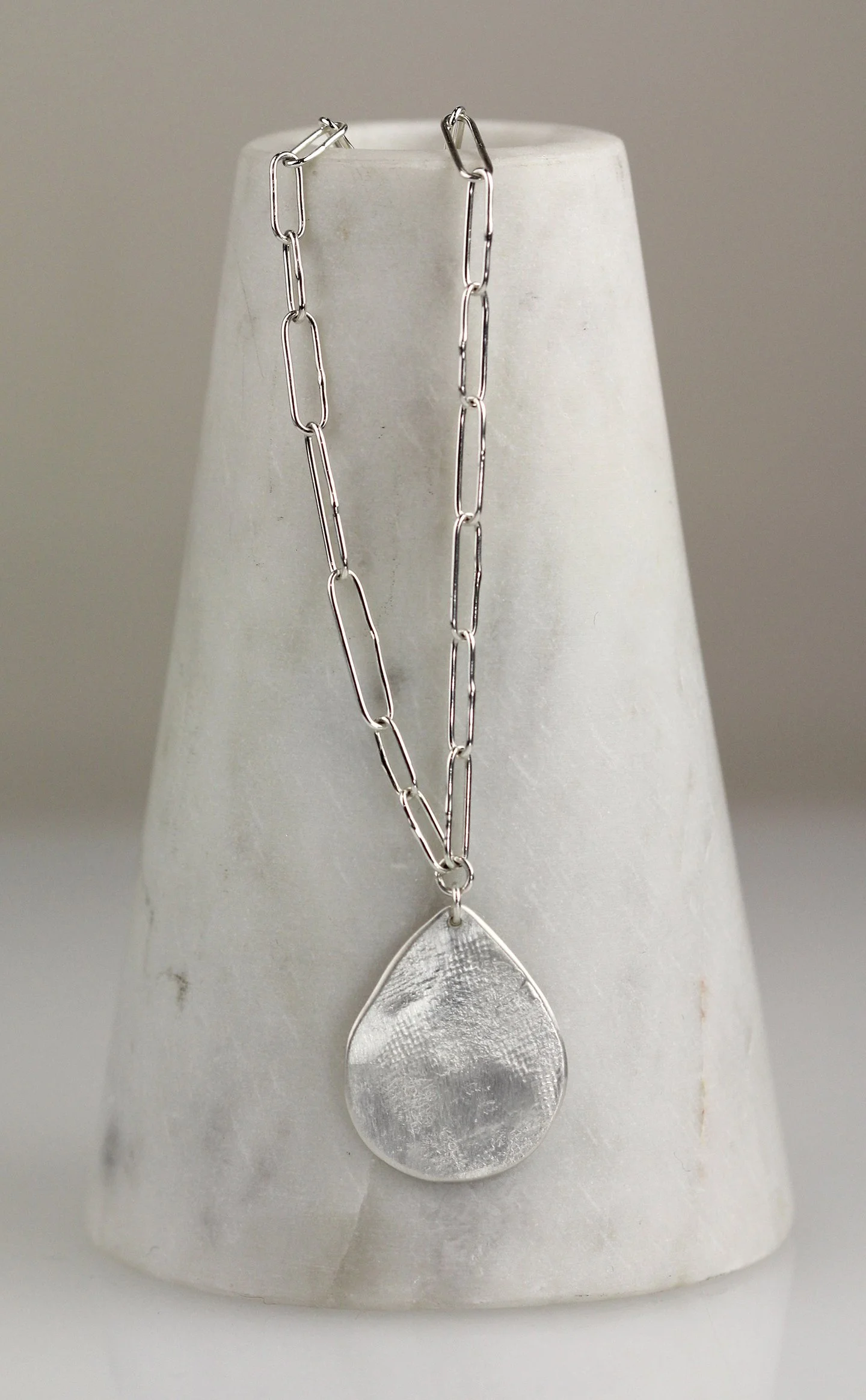 TannerNecklaceOnMarble1web.jpg